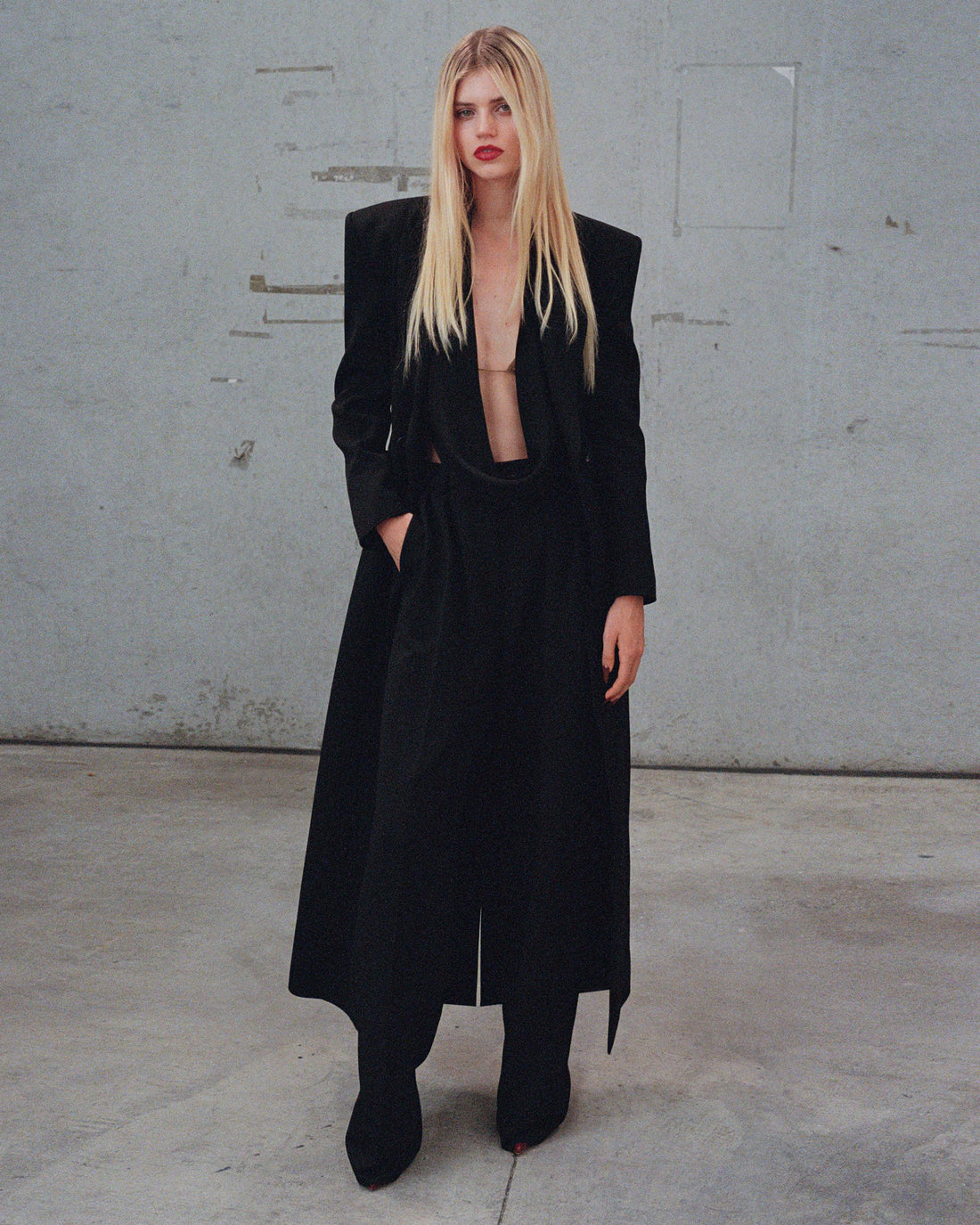 Alex Perry Pre Fall 2025 Look 19 — Double Breasted Contour Coat in Wool Suiting, Halter Top in Wool Suiting, Bikini Top in…