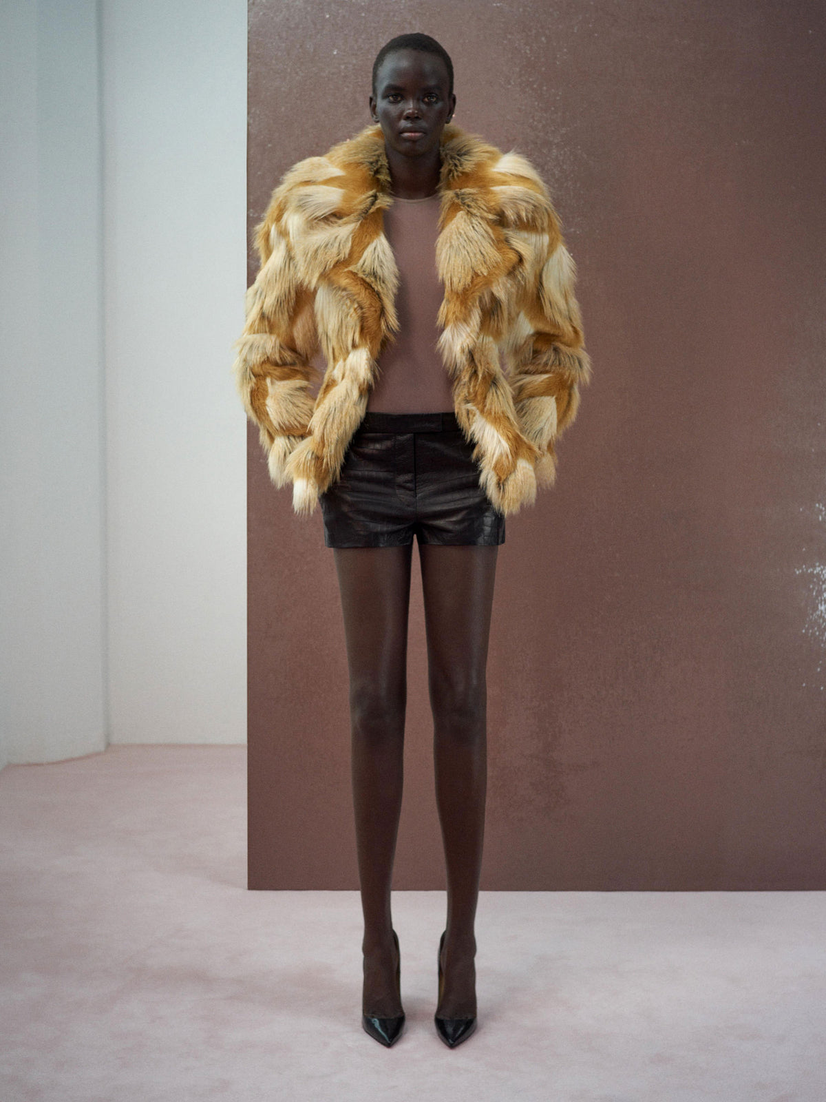 Alex Perry Resort 2026 Look 7 - Contour Jacket in Faux Fur, Singlet Bodysuit in Stretch Mesh & Low Rise Short in Embossed…
